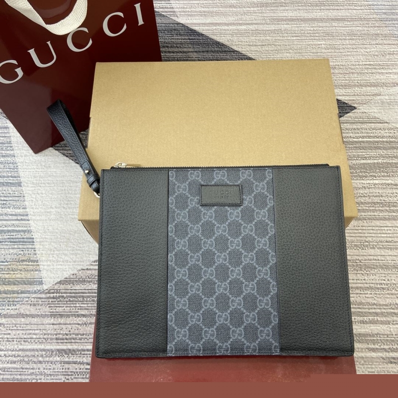 G*u*i clutch bags
